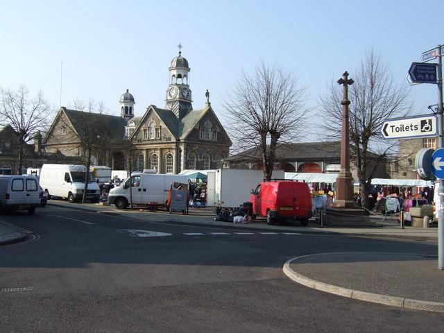 Thetford Market Place with vans parked near the Guildhall